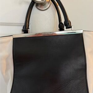 Black and White Leather bag by Michael Kors. W silver accents. Gorgeous